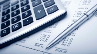 Yıl bittikten sonra kesinleşen giderler hangi yıla aittir?